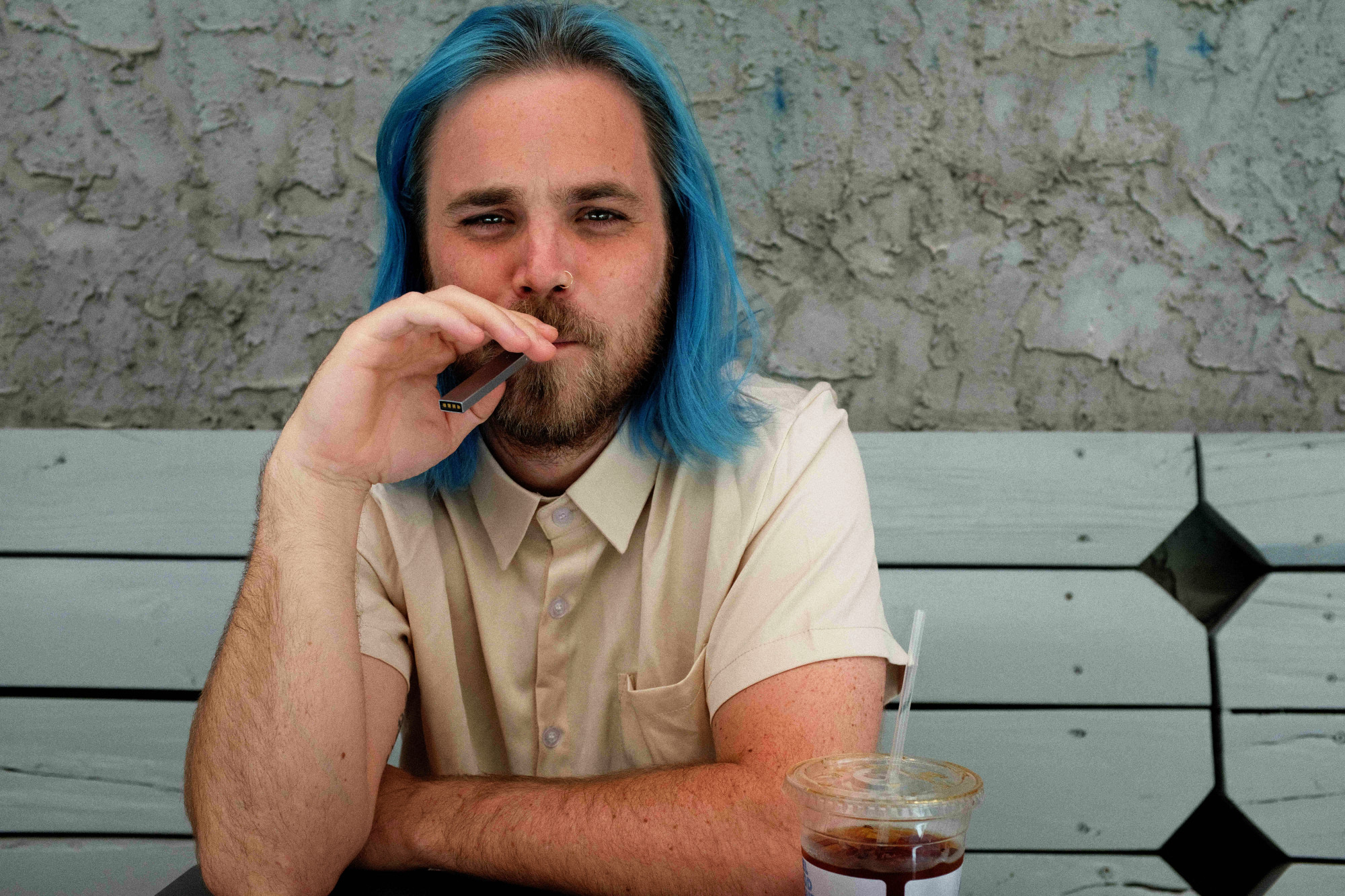 A blue-haired writer vaping a Juul at a cafe in Williamsburg, who would've thought?